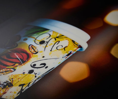 Front panel for coffee machines with digitally printed graphic details