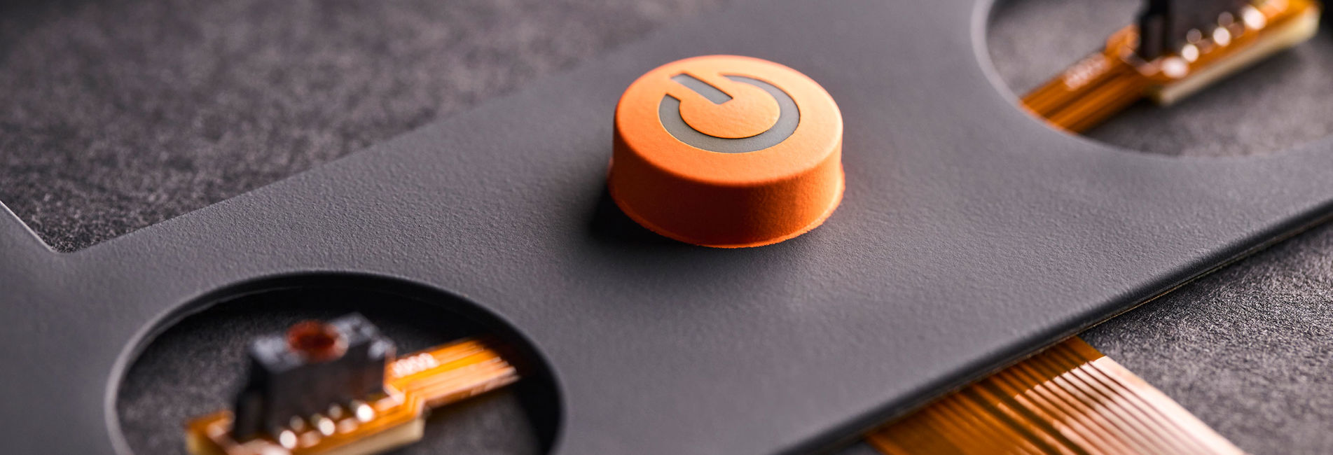 Silicone rubber keypad for controlling welding equipment.  Add colour to your rubber keypad by co-moulding different coloured silicone rubbers, by spray-painting or silkscreen printing.