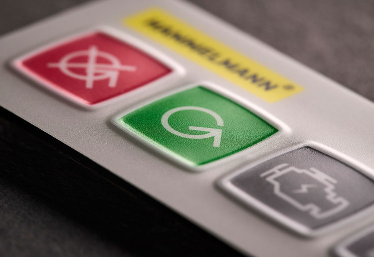 Membrane switch keypad with frame embossed keys in different colours - for industrial machinery