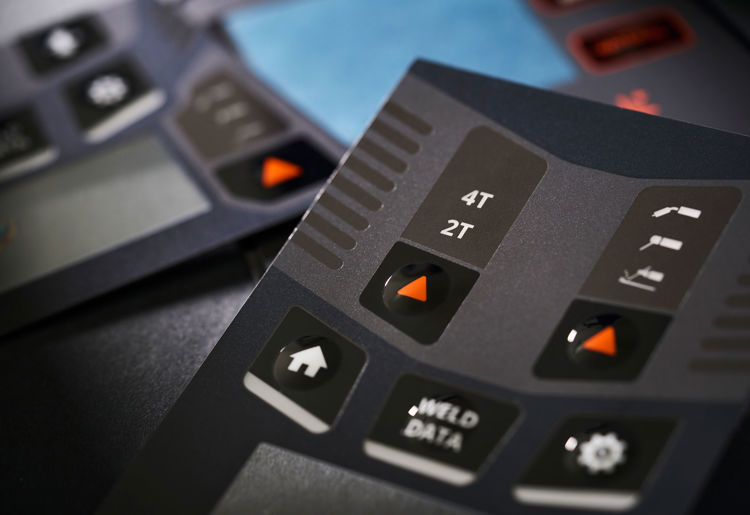 Graphic overlay with high gloss contrast on the embossings. 