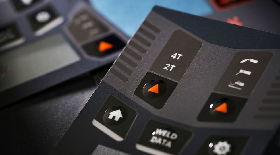 Graphic overlay with high gloss contrast on the embossings. 